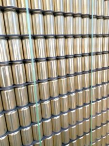 Pallet of beer cans with banding for storage